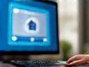 Person uploading photos on computer